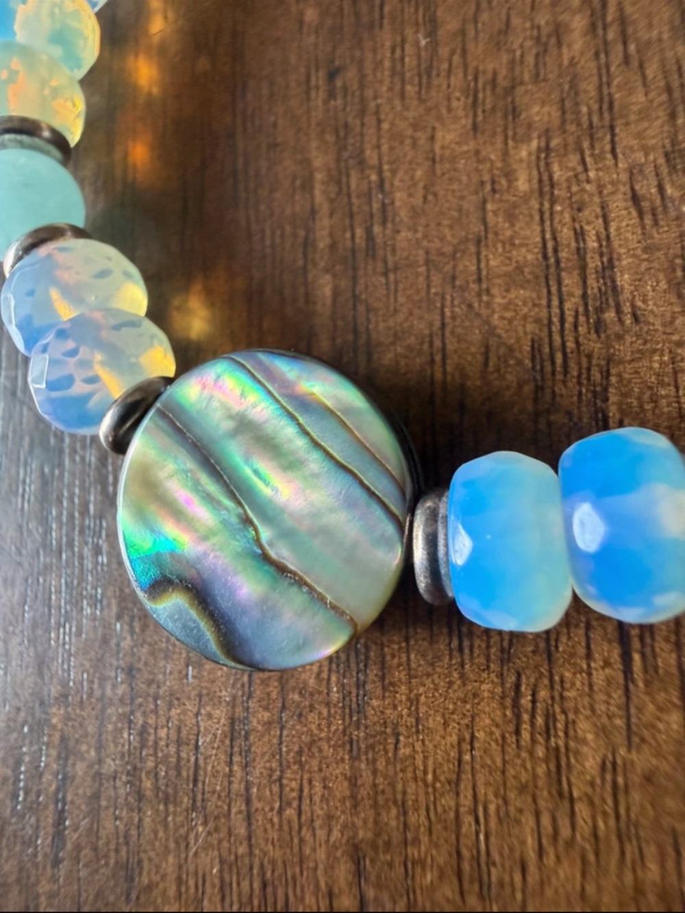 T Jazelle Iridescent Blue Opalescent Beaded Stretch Bracelet with Abalone Accent - Picture 2 of 3